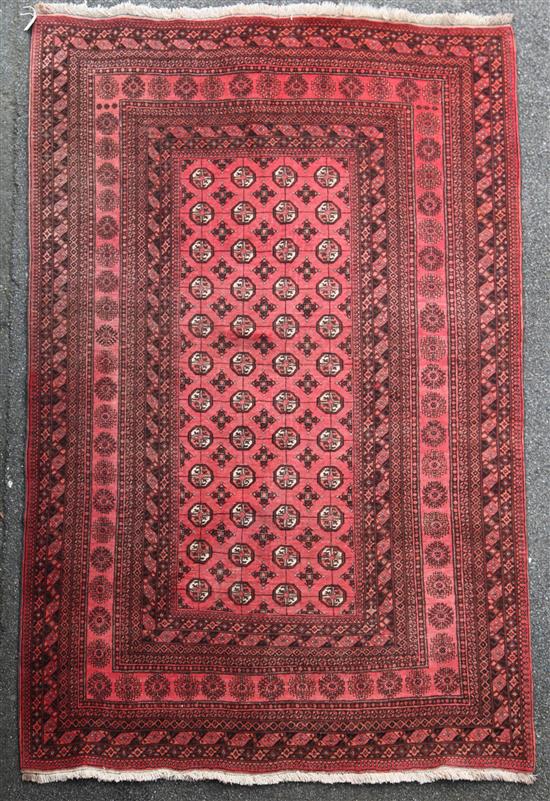 A Bokhara carpet, 9ft 6in by 6ft 10in.